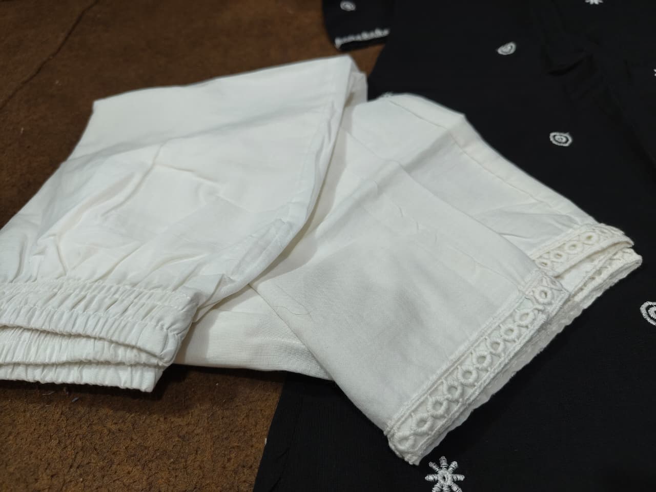 White palazzo with lace border detail