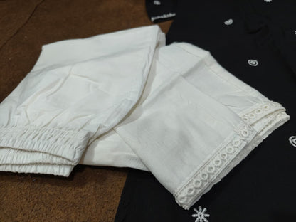 White palazzo with lace border detail