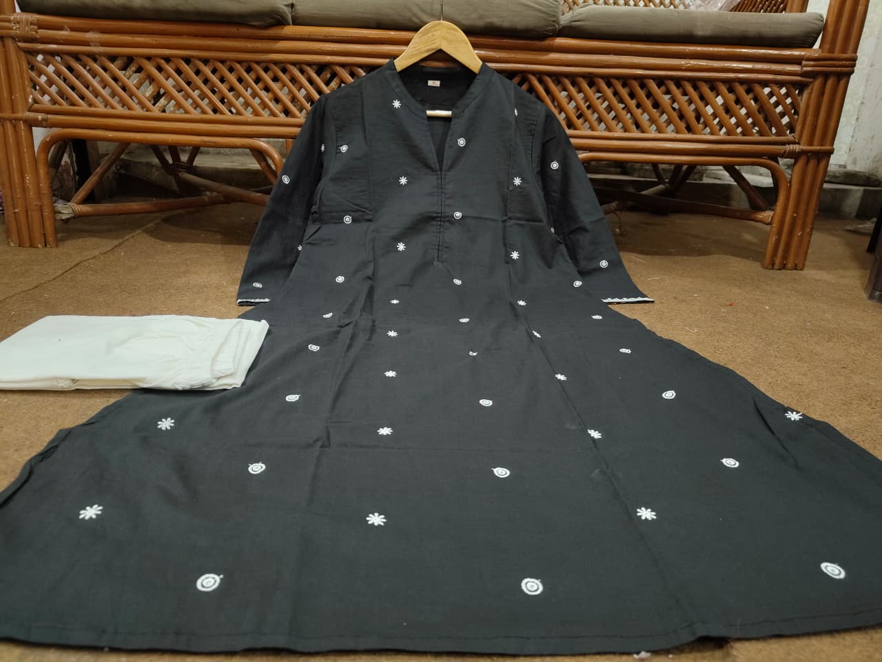 Full co-ord set laid out – black kurti and white palazzo