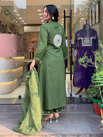 Green kurta set back view showing embroidery