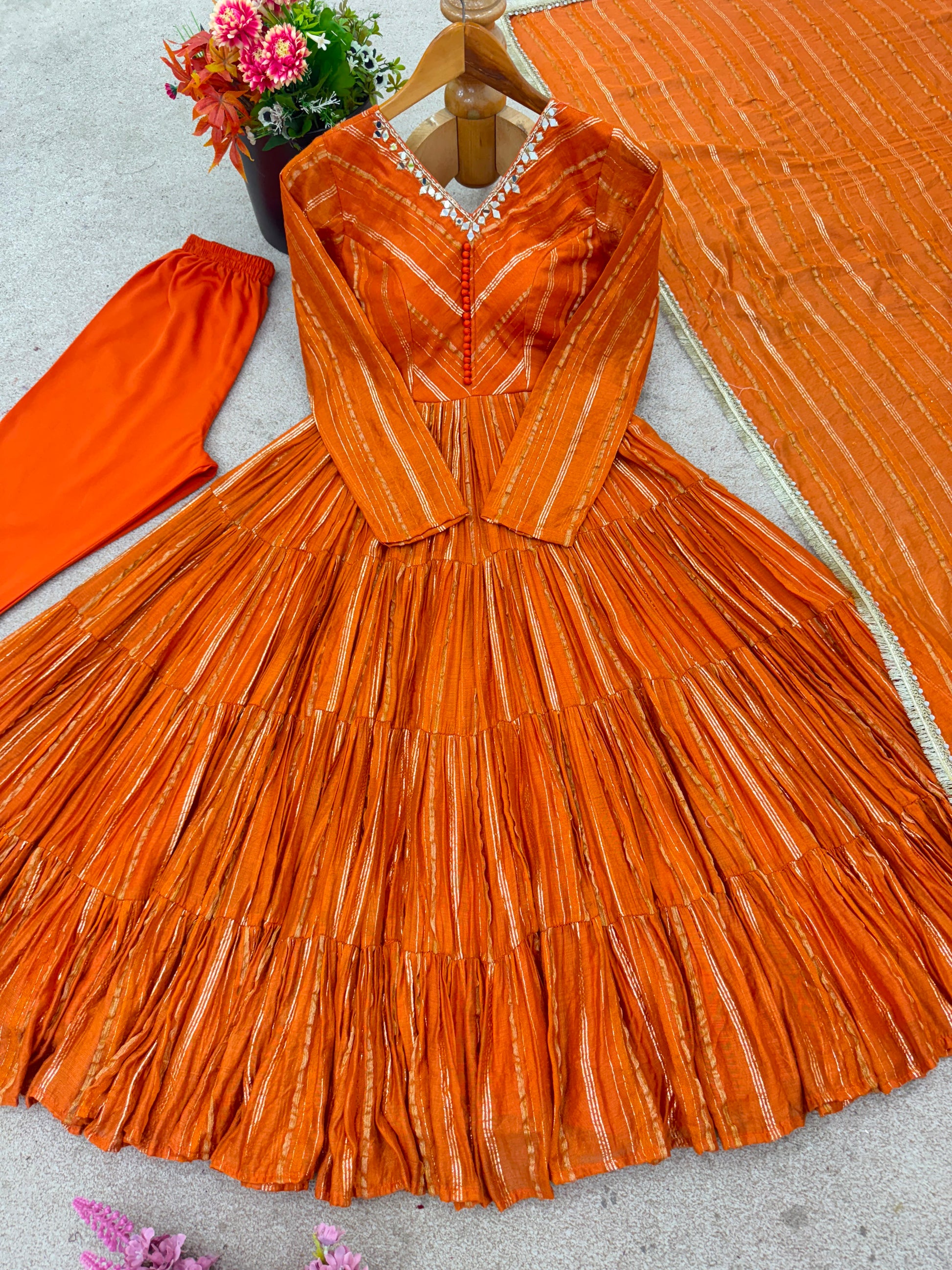Orange Ruffle Anarkali Gown flat lay with dupatta and pant