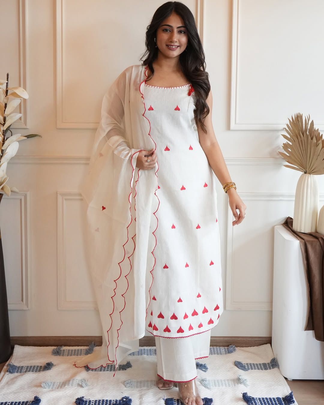 In this design you will see sleeveless kurta and elegant embroidery work